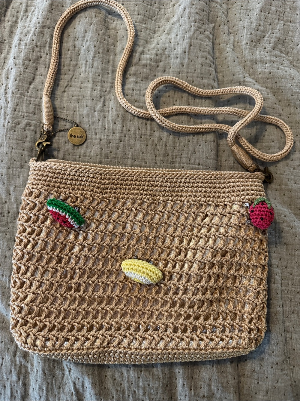 The Sak Crochet Crossbody Bag in Beige with Fruit Accents